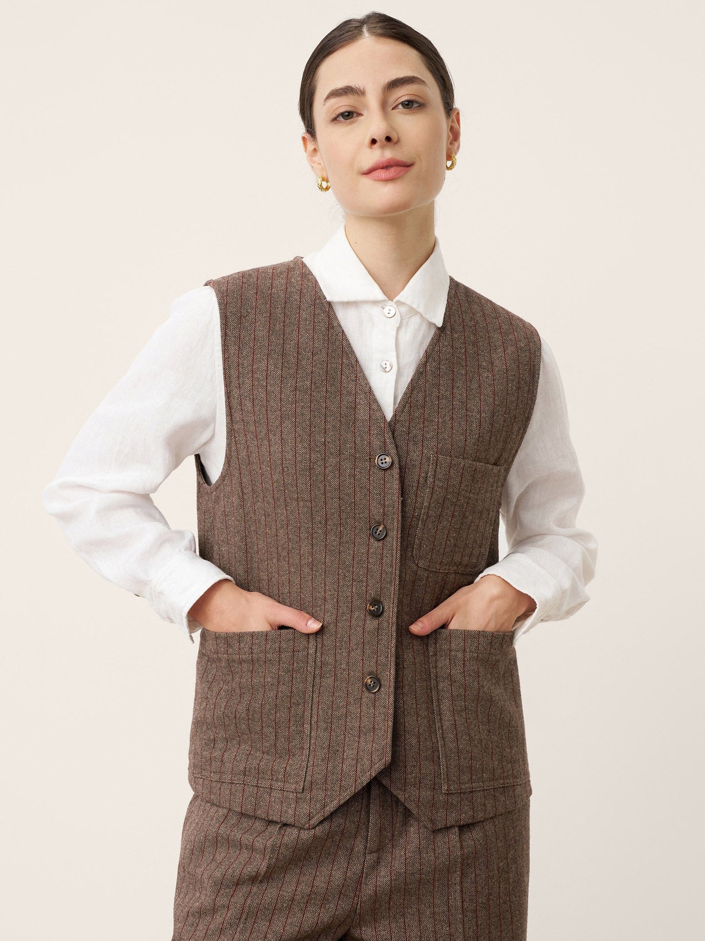 Gilet à rayures en laine avec col en V et détails de boutons ELUNED