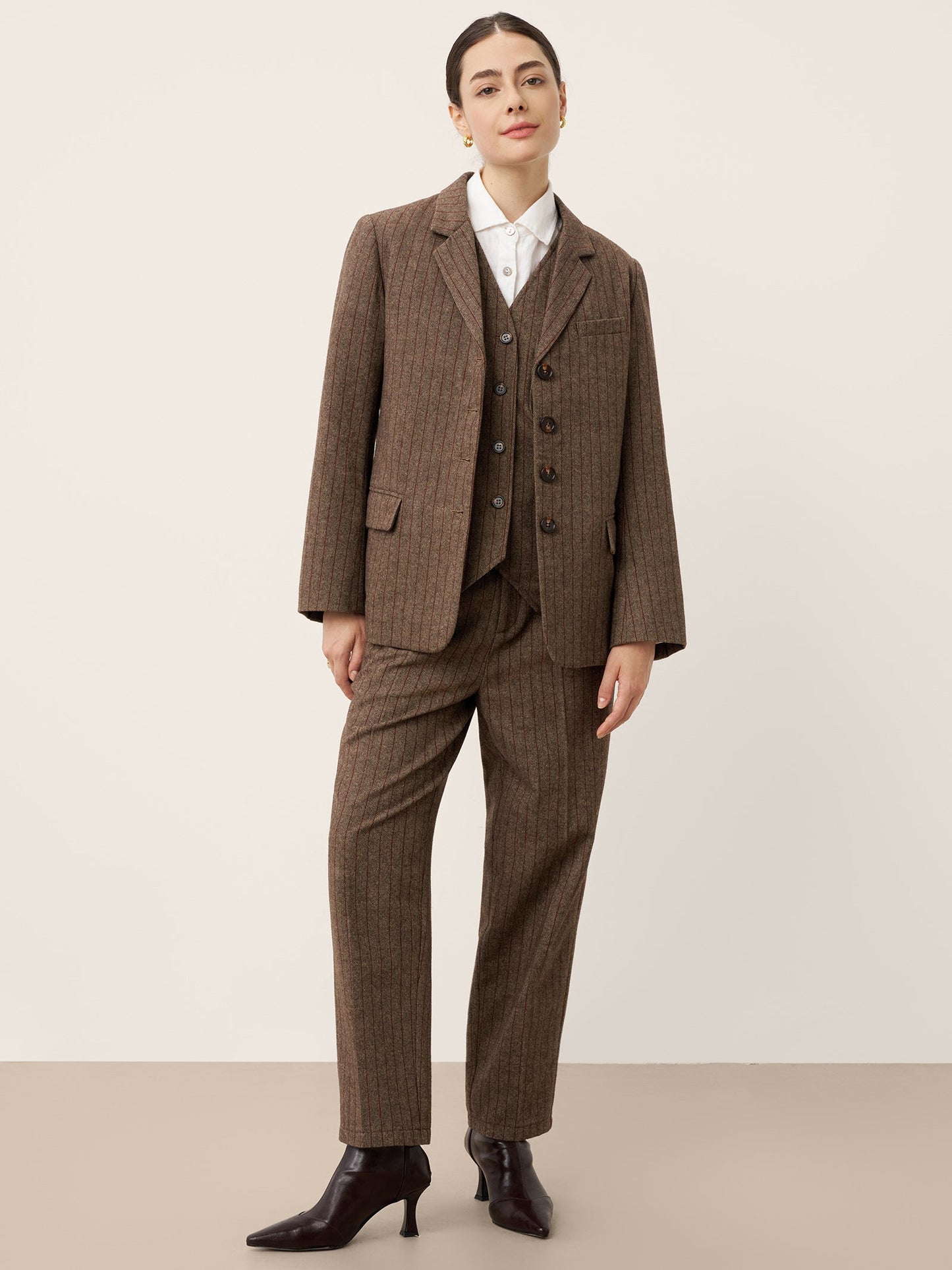 Gilet à rayures en laine avec col en V et détails de boutons ELUNED